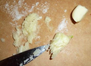 working salt into garlic for bruschetta