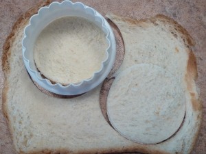 Easy Escargot - cutting flattened bread