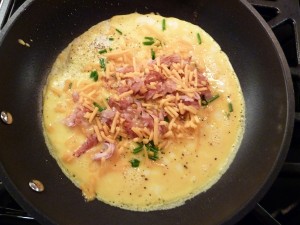 Ham and Cheese Omelet - egg and fillings added