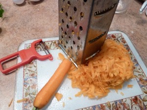 Peeling and grating the carrots