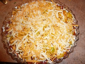 Layered Nacho Dip - top with the cheese
