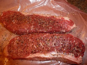Steak with Green Peppercorn Sauce - season the steaks