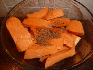 Roasted Sweet Potato Wedges - sprinkle the seasonings on the potatoes