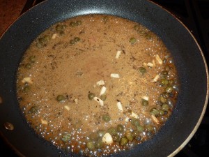 Veal Piccata - add the wine, chicken stock, garlic, lemon juice and capers