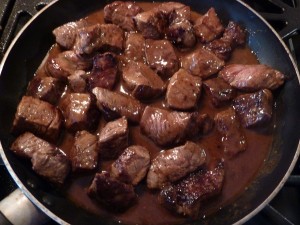 Beef Stew with Green Peppercorn Sauce - simmer