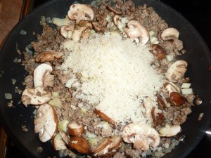 Grammy's Meat Pie (Tourtierre) - add the bread crumbs and stock