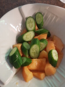 Cantaloupe and Cucumber Salad with Spicy Pepitas - mix the cantaloupe and cucumber
